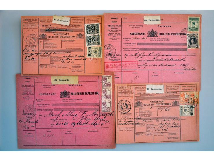 23 pakketkaarten met diverse frankeringen, alle naar de USA verzonden