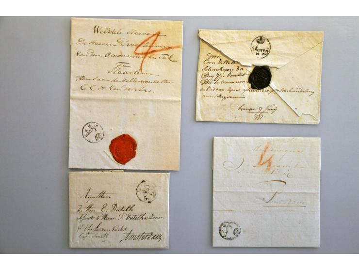 32 poststukken met vertrekstempels w.b. AMSTERDAM met posthoorn (2x), zwak B; OP ZOOM met veren, DELFT met veren (3x), GOUDA 