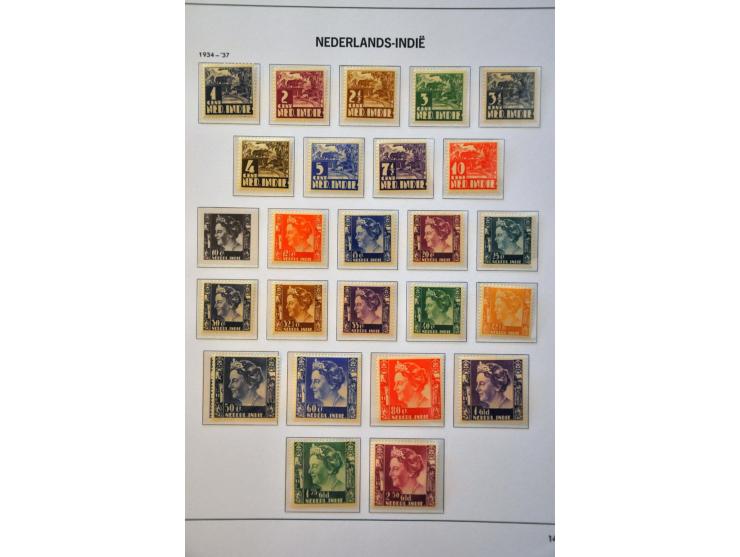 en Nieuw-Guinea collectie 1899-1948 */** met beter materiaal w.o Kreisler, Van Konijnenburg 25 gulden etc. in Davo album