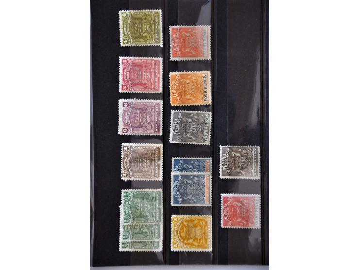 collection including Northern and Southern Rhodesia with better stamps (Rhodesia SG 204 * signed Holcombe) in KaBe album and 