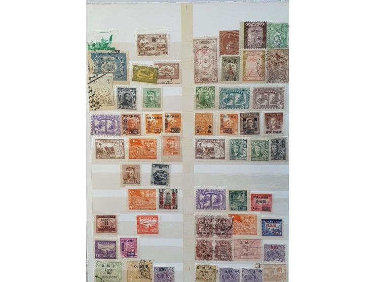 mainly older material with varieties and errors, complete sheets, postal stationery cut outs, revenues etc. in 4 stockbooks a