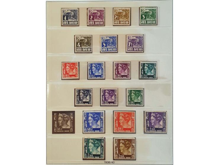 en Nieuw-Guinea collectie 1864-1962 zowel */** als gestempeld verzameld met betere ex. en series o.a. nr. 1*, emissie 1870, J
