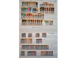 collectie * en gestempeld, in gemengde kwaliteit, in 6 albums in doosje