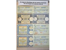 International Reply Coupons ruim 260 ex. w.b. veel Antillen en Suriname in insteekboek